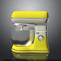 Yellow Electric Stand Mixer With Silver Mixing Bowl And Control Knob