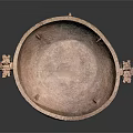 Ancient Bronze Vessel With Ornate Dragon Head Handles And Intricate Carved Patterns