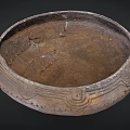 Ancient Clay Bowl With Intricate Carved Patterns And Weathered Surface From Historical Artifact Collection
