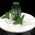 Medical Device Green Bottle With White Tablets And Fresh Leaves On Marble Table