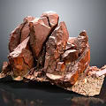 Reddish Brown Natural Stone Featuring Visible Texture Cracks and Soil Gravel Base