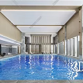 Modern Indoor Swimming Pool With Large Glass Windows Ample Natural Light And Relaxation Area