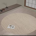 Beige Woven Round Area Rug on Wooden Floor with Open Book and Window