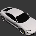 Silver Porsche Electric Four Door Coupe With Sleek Modern Exterior And Yellow Brake Calipers