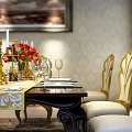 Elegant Dining Table Set With Golden Chairs Patterned Tablecloth Candelabra Red Flowers And Wine Glasses