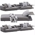 Modern Gray Sectional Sofa With Plush Pillows Patterned Blanket And Sleek Design 3d model