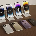 Apple iPhones On Stands And Laid Flat With Colorful Screens And Various Colors