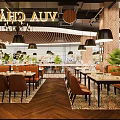 Elegant Modern Restaurant Interior With Wooden Decor Pendant Lights And Green Plants