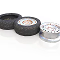 Automotive Car Parts with Worn Black Tires and Silver Wheel Rims