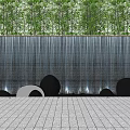 Stunning Waterfall Water Wall With Lush Green Backdrop Decorative Smooth Stones And Lighted Tiled Floor