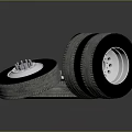 Stacked Car Tires With Silver Rims And Tread Patterns On Dark Surface 3d model