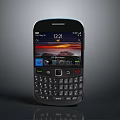 Mobile Phone With Physical Keyboard And Screen Displaying Time Date App Icons Sunset Background