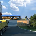 Industrial Factory Exterior With Silos Yellow Trucks Gravel Materials Blue Roof And Outdoor Road