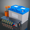 Household Electrical Appliances Featuring Blue Battery Device With Orange Knobs And Tools
