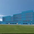 Blue Multi Story Industrial Factory Building With Grey Roof Green Grass And Road