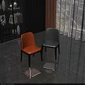 Modern Orange and Gray Upholstered Dining Chairs with Black Legs in Room Interior
