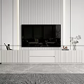 Modern White TV Stand With Vertical Striped Wall TV And Decorations