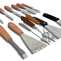 Various Craft Tools With Wooden And Black Handles And Metal Blades