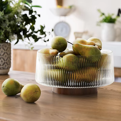 Clear Glass Kitchen Bowl With Wooden Base Filled With Fresh Pears On Table 3d model