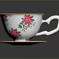 White Ceramic Teacup And Saucer With Pink Floral Pattern And Gold Trim