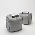 Gray Fabric Ottomans With Purple Cover Books Placed On Top For Home Decor