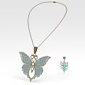 Butterfly Themed Jewelry Set With Blue White Winged Pendant Golden Chain And Small Gemstone Accessory