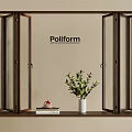 Poliform Folding Glass Doors Interior Design With Potted Plant And Books