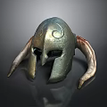Intricate Metallic Helmet Carving Sculpture With Curved Designs And Horn Like Structures