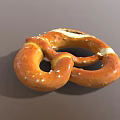 Golden Salted Pretzel With Twisted Shape And White Salt Crystals