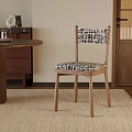 Stylish Black And White Leisure Chair With Wooden Legs And Patterned Upholstery In Modern Interior