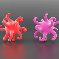 Two Red And Pink Organ Models With Tentacle Like Structures On Gray Background