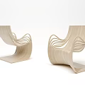 Light Wood Single Chair with Modern Curved Lines and Sleek Minimalist Design