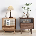 Wooden Bedside Tables With Light And Dark Wood Featuring Table Lamp Potted Plant And Decor