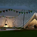 Cozy Outdoor Tent With Colorful Bunting Flags String Lights Bonfire Stone Wall And People Inside