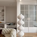 Modern Dining and Living Room Interior With Large Window Green Plants Fireplace and White Sofa