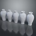 White Sculpture Carving Vases With Various Textures Shapes Spiral Patterns Petal Edges And Reflections