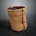 Handwoven Natural Fiber Storage Basket With Handcrafted Texture And Twisted Rope Detail