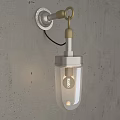 Modern Minimalist Wall Lamp with Transparent Glass and Metal Base on Concrete Wall