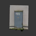 Outdoor Gray Electrical Box Mounted On Concrete Wall With Growing Weeds