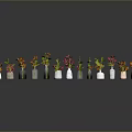 Sculpted Ceramic Vases With Colorful Flowers Arranged In A Row On Gray Background With Reflection
