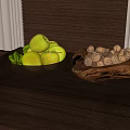 Fresh Green Apples in Black Plate and Walnuts in Wooden Tray on Dark Wooden Table