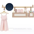 Wooden Wall Hook With Pink Polka Dot Dress Hanger And Storage Bags Holding Rabbit Toy