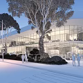 Modern Commercial Street With Glass Facade Trees Pedestrians And Evening Lights