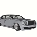 Gray Luxury Sedan With Large Chrome Wheels Black Grille And Elegant Design