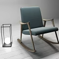 Deep Blue Upholstered Rocking Chair with Wooden Frame and Modern Minimalist Design