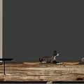 Rustic Wooden Console Table With Dog Figurine Vase Pinecones And Books