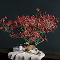 Decorative Ornament Set With Red Flowers In Vase On Linen Cloth And Small Items