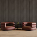 Brown Leather Single Sofa With Rounded Design And Small Round Table Against Dark Wooden Wall 3d model