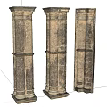 Three Classical Stone Pillars With Textured Surface And Decorative Details