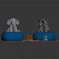 Two Elephant Dolls On Blue Bean Bags With Colorful Blocks Small Toys And Orange Carpet